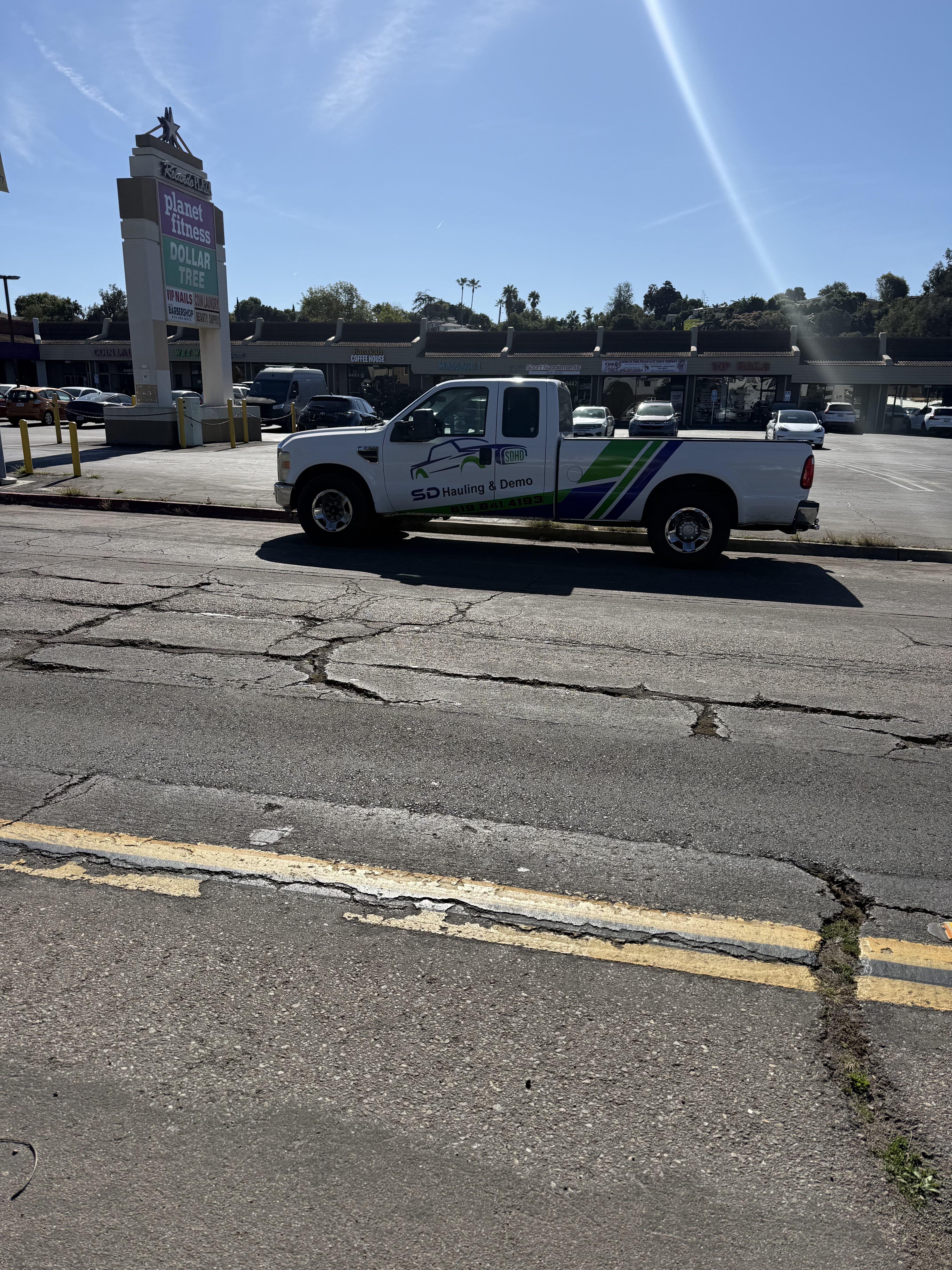 SD Hauling and Demo truck side view